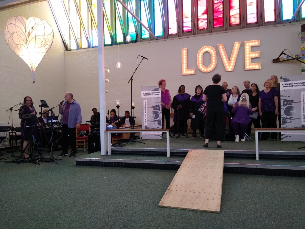 community choir singing at platinum jubilee celebration